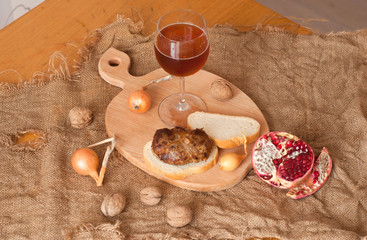 A glass of brown beer on the wooden board
