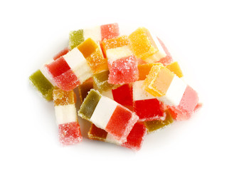 Tasty marmalade candies on white background