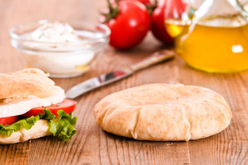 Puccia bread with mozzarella and tomato.