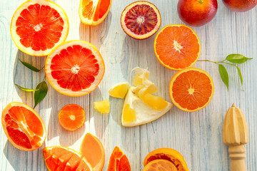 Naklejka na ściany i meble Beautiful composition with citrus fruits on wooden background