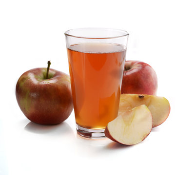 Ripe apple and a glass of apple juice