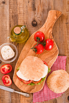 Puccia bread with mozzarella and tomato.