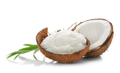 Composition with coconut oil in shell on white background