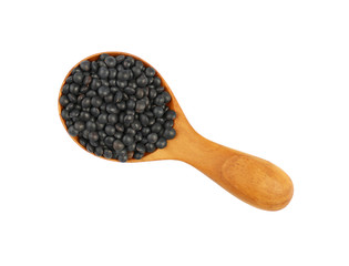 Black Beluga lentil lens in wooden scoop on white