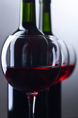 Bottles and glasses of red wine