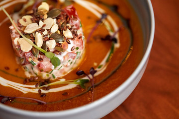 close up of vegetable pumpkin-ginger soup in bowl