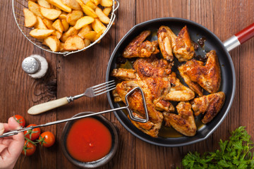 Baked wings, served with dip or baked potatoes.