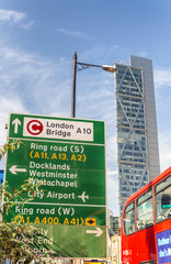 LONDON - MAY 2013: Red Double Decker bus along city streets. London attracts 30 million tourists...