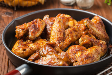 Baked wings, served with dip or baked potatoes.