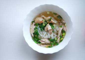 Bowl of chicken pho. Pho ga. Rice noodle soup.