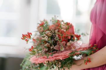 Bridal bouquet with spring flowers in pink