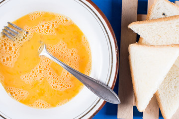 Closeup macro mixed eggs flat lay metal plate