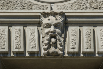 relief  statue of a bearded man on a facade in Zurich , Switzerland