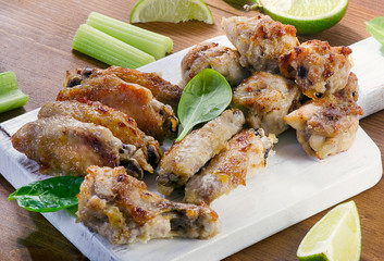 Chicken wings on cutting board
