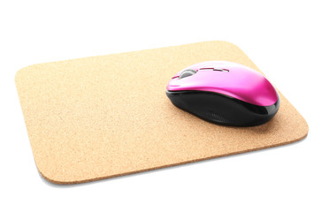 Modern wireless mouse and pad on white background