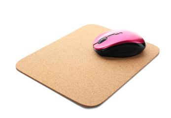 Modern wireless mouse and pad on white background