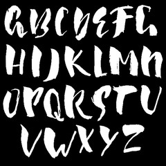 Hand drawn dry brush font. Modern brush lettering. Grunge style alphabet. Vector illustration.