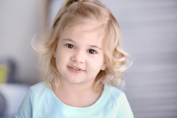 Cute little girl at home