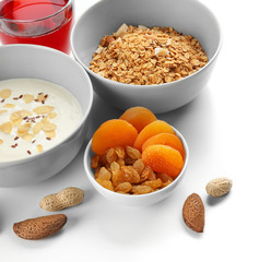 Composition with tasty yogurt on white background