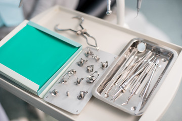 Different professional dental instruments in a dentist's office