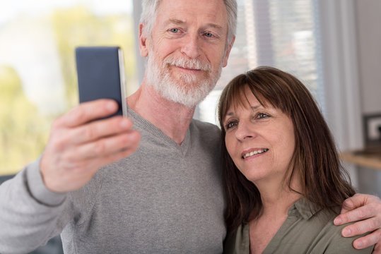 Mature couple taking a selfie