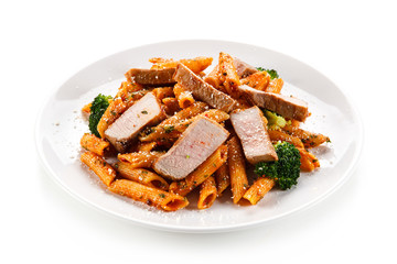 Pasta with vegetables on white background