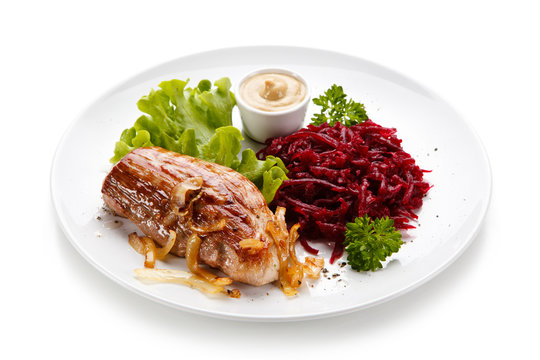 Grilled meat with beetroots on white background