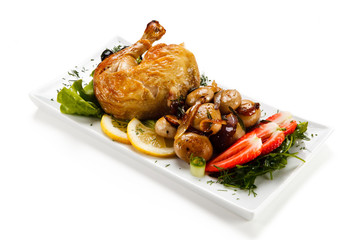 Roast chicken leg with mushrooms