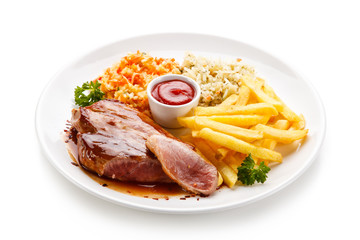 Grilled steak with french fries on white background