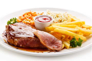 Grilled steak with french fries on white background