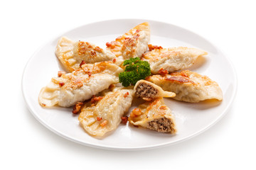 Dumplings - stuffed noodles on white background