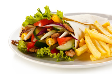 Tortilla wrap with french fries on white background