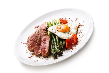 Grilled steak - fillet mignon with asparagus and fried egg