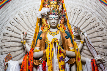 The Avalokitesvara, a Tibetan Buddhist saint with a thousand hands at Lamayuru Monastery in the Indian Himalaya. Lamayuru, Ladakh, India. - obrazy, fototapety, plakaty