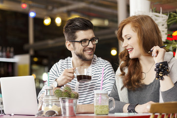Freelance couple working on laptop