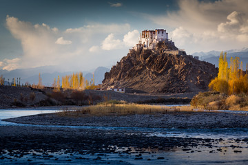 The Buddhist monastery of Stakna above Indus river in the Indian Himalaya in late autumn. Stakna,...