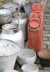 bins and metal buckets used to transport the milk