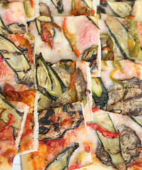 Obraz na płótnie Canvas pizza with zucchini eggplant and peppers and many mozzarella che