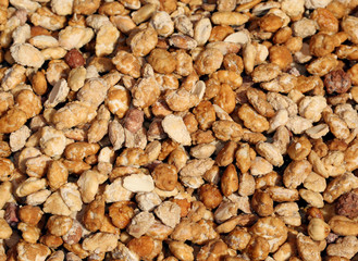 background with lots of toasted peanuts and covered with cooked