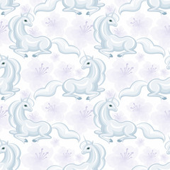 Seamless pattern with the image of a beautiful fantastic unicorn. Colorful vector background.
