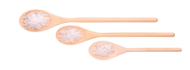 Three wooden spoons and white bath salt.