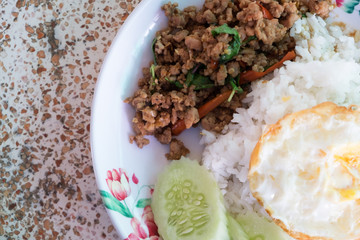 Rice topped stir-fried chicken and basil with Fried egg