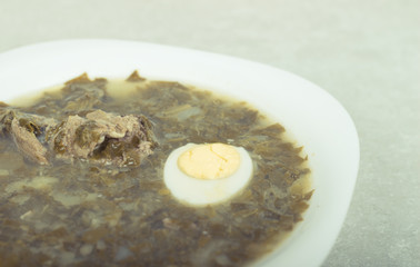 Green borsch with sorrel and boiled eggs