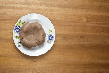 An isolated picture of a plate of amala