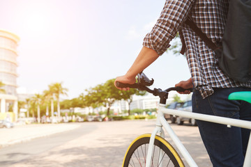 Naklejka premium Walking with bicycle
