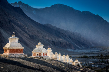 Buddhist stupas at Diskit village in Nubra valley in the Indian Himalaya. Diskit, Ladakh, India