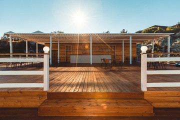 Wooden terrace with view on sea and sunset  resort travel concept Gelendzhik, North Caucasus, Russia