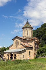 Fototapeta na wymiar Orthodox church in a mountain monastery on a summer day