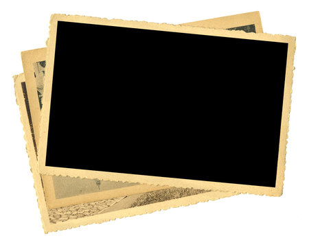 stack of old photos, yellowed and bleeched, free space for pix, isolated on white