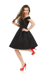 Elegant Happy Woman Is Dancing On One Leg